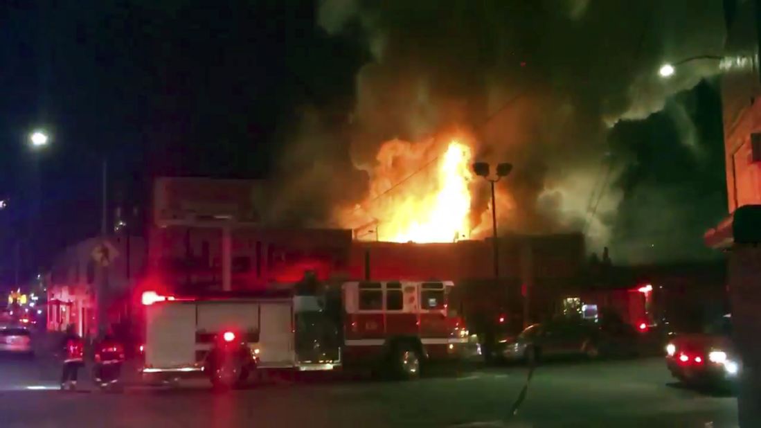 The scene as firefighters battle the blaze from video footage by <a href="https://twitter.com/OaklandFireLive" target="_blank" target="_blank">@Oaklandfirelive</a> early Saturday, December 3.  