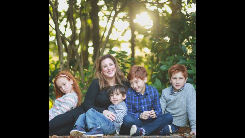 Monica Schulman, 38, with her four children. She is among the 15% of Parkinson's disease patients under the age of 40.