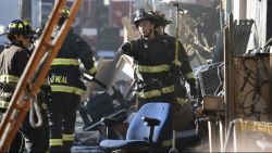 Firefighters assess the scene where a deadly fire tore through a late-night electronic music party in a warehouse in Oakland, California, December 3. Officials described the scene inside the warehouse, which had been illegally converted into artist studios, as a death trap that made it impossible for many party goers to escape the Friday night fire.