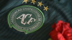 The badge of the Chapecoense Real Brazilian football team, most of whose members were killed in a November 28 plane crash in the Colombian mountains, seen during a tribute at the club's Arena Conda stadium in Chapeco, in the southern Brazilian state of Santa Catarina, on December 2, 2016. 
A Bolivian charter airline whose plane ran out of fuel crashed in the Colombian mountains earlier this week killing 71 people, including most of the Brazilian football team. / AFP / DOUGLAS MAGNO        (Photo credit should read DOUGLAS MAGNO/AFP/Getty Images)