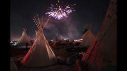 CANNON BALL, ND - DECEMBER 04:  Fireworks fill the night sky above Oceti Sakowin Camp as activists celebrate after learning an easement had been denied for the Dakota Access Pipeline near the edge of the Standing Rock Sioux Reservation on December 4, 2016 outside Cannon Ball, North Dakota. The US Army Corps of Engineers announced today that it will not grant an easement to the Dakota Access Pipeline to cross under a lake on the Sioux Tribes Standing Rock reservation, ending a  months-long standoff.  (Photo by Scott Olson/Getty Images)