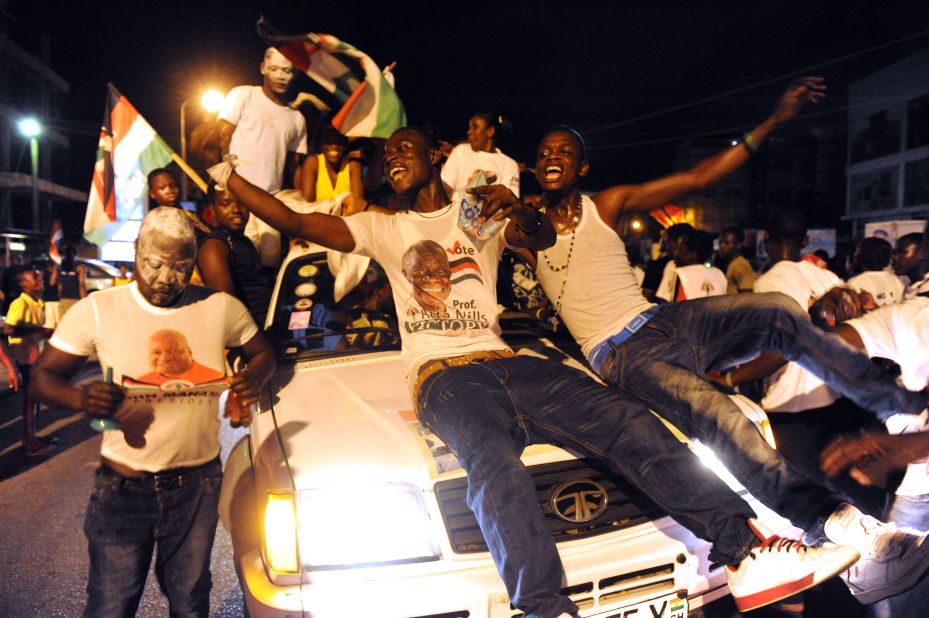 Supporters of the National Democratic Party celebrate in Accra the re-election of incumbent John Dramani Mahama after he was declared winner of of the presidential election.