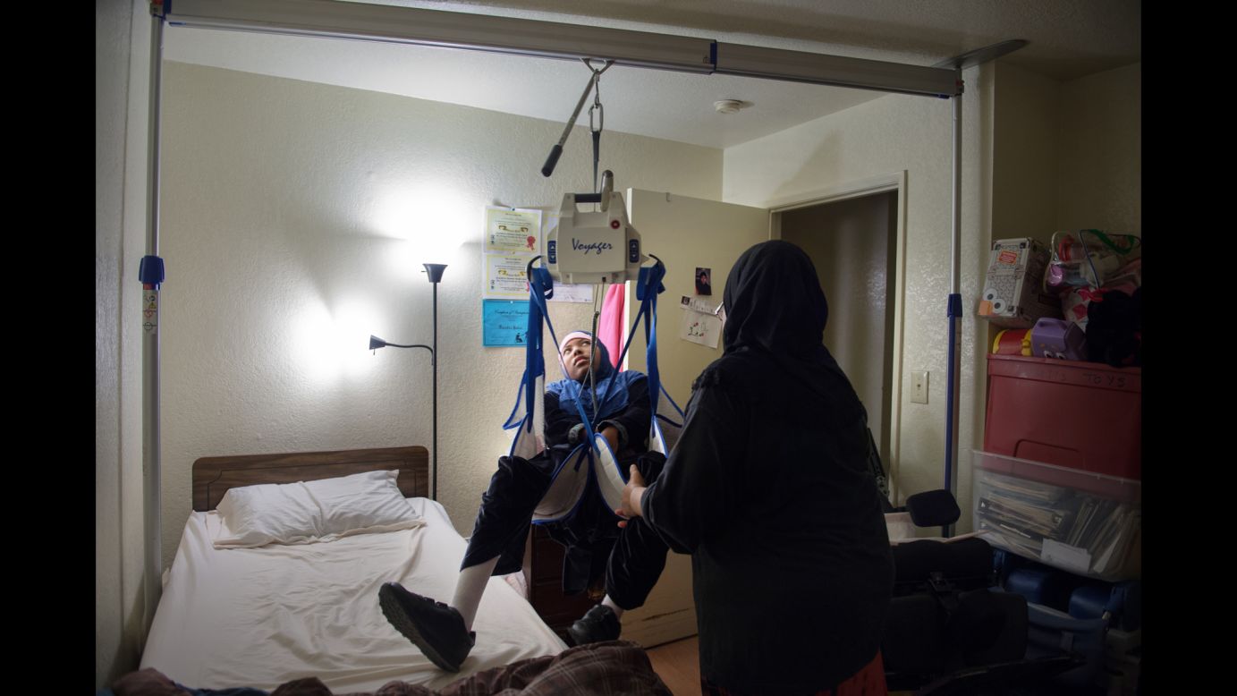Savitri Baker has cerebral palsy, developmental delays, seizures and spastic quadriplegia. She was born weighing 1½ pounds. Now more than 100 pounds, she has a lift system in her bedroom to help her mother, Beverly Baker-Ajene, move her between her bed and her wheelchair.