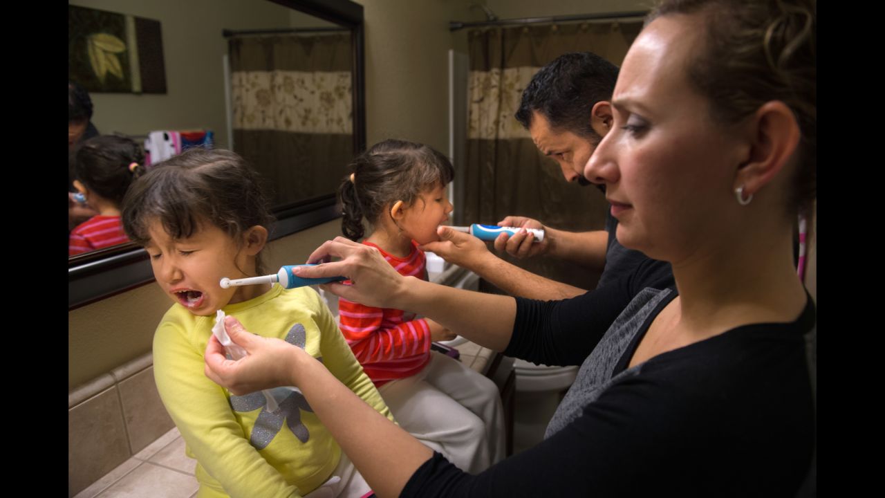 Twins Celeste and Alexia Madrigal were each born without one kidney, and each had open-heart surgery. They have 22q deletion syndrome, which, among many things, affects their teeth. Only 4 years old, Celeste has already had a full dental restoration. Parents Americo and Criss must brush the girls' teeth after every meal.