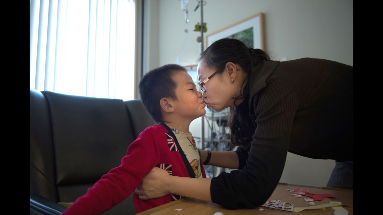 Pei kisses her son, Edward. "Maybe it's the impact you make that is ultimately the meaning of life," says Pei, who has become an advocate for her sons and other special needs children. "If you think of it that way, it doesn't matter if your life is short or long. My boys have already made an impact."