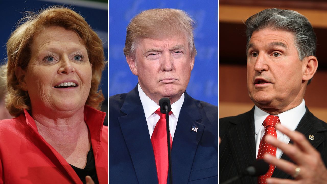 It's unclear whether Sen. Heidi Heitkamp (left) will serve in President-elect Donald Trump's administration, but Sen. Joe Manchin (right) ruled it out Tuesday. 