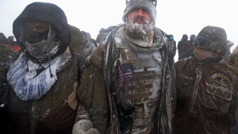 Despite blizzard conditions, military veterans march in support of the "water protectors" at Oceti Sakowin Camp.
