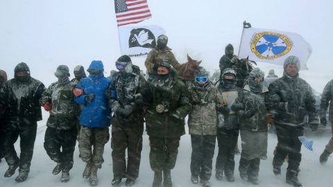 Veterans march on the edge of the Standing Rock Sioux Reservation on December 5, 2016.