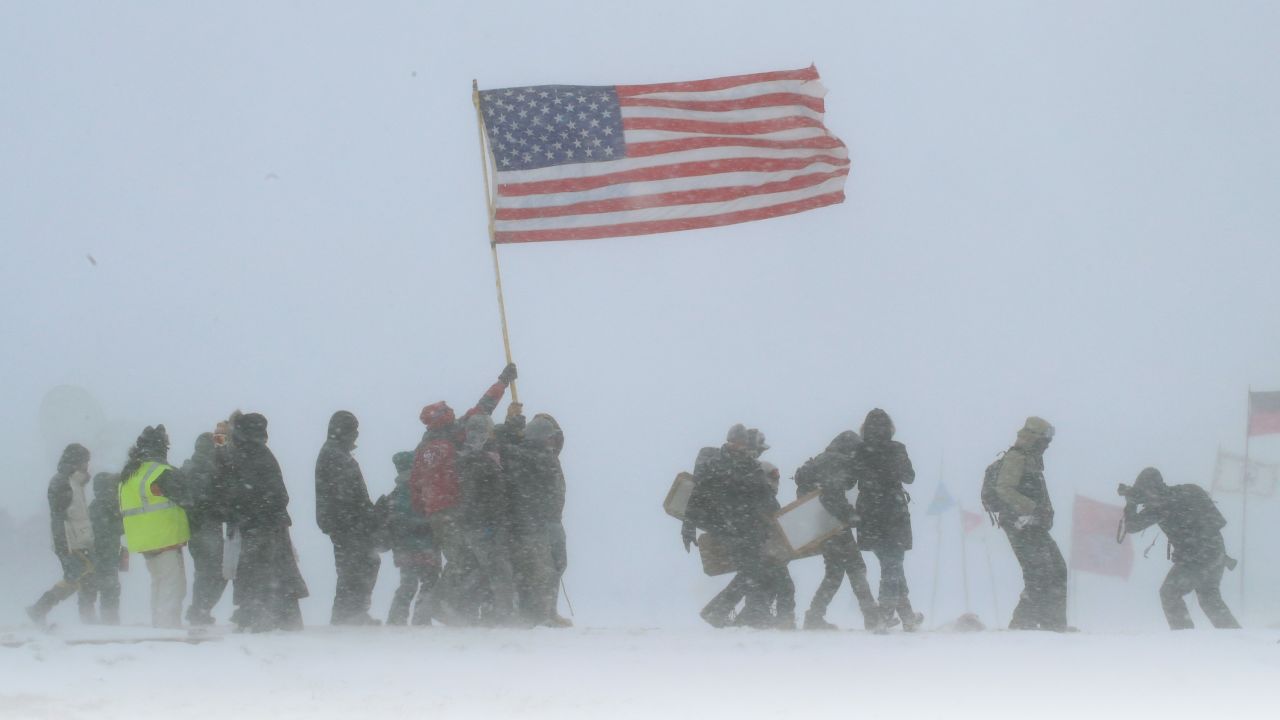 Military veterans march in support of protesters at the Standing Rock Sioux reservation on December 5. 