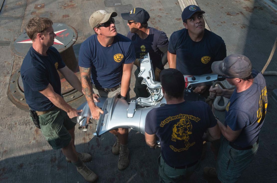 US sailors have worked to recover ships lost in the Java Sea, including the USS Houston.