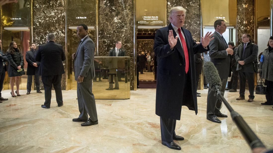 Trump speaks to members of the media at Trump Tower in New York on December 6. 