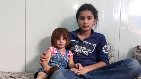 Ahmed Mushal Hassan's son Yousif, right, and daughter Asal were away from home when ISIS took over Mosul.