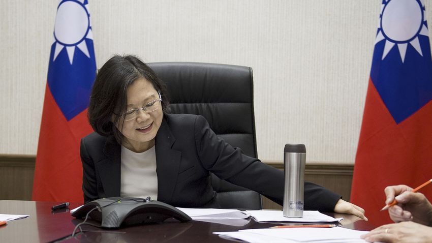 In this Friday, Dec. 2, 2016 photo released by Taiwan Presidential Office Saturday, Dec. 3, 2016, Taiwan's President Tsai Ing-wen, center, flanked by National Security Council Secretary-General Joseph Wu, left, and Foreign Minister David Lee, speaks with U.S. President-elect Donald Trump through a speaker phone in Taipei, Taiwan. (Taiwan Presidential Office via AP)