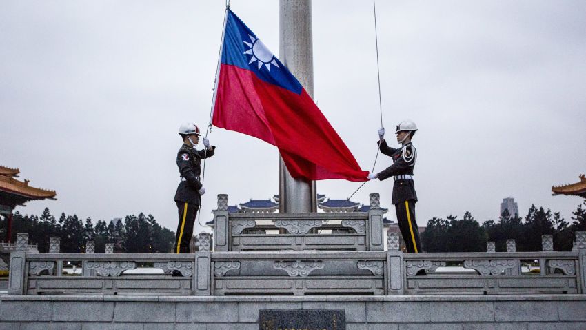 TAIPEI, TAIWAN - JANUARY 14:  Honor guards raise the Taiwan flag in the Chiang Kai-shek Memorial Hall square ahead of the Taiwanese presidential election on January 14, 2016 in Taipei, Taiwan. Voters in Taiwan are set to elect Tsai Ing-wen, the chairwoman of the opposition Democratic Progressive Party, to become the island's first female leader.  (Photo by Ulet Ifansasti/Getty Images)