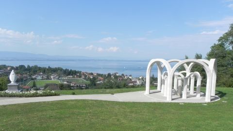 The Virgin Mary statue sits on public land in a park overlooking Lake Geneva.