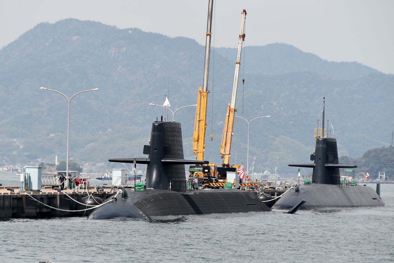 Japan Maritime Self-Defense Forces submarines are moored at a pier in Kure, Hiroshima prefecture on April 12, 2016. Japan has 18 submarines.