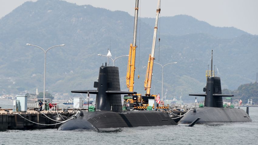 Japan Maritime Self Defence Forces submarines are moored at a pier in Kure, Hiroshima prefecture on April 12, 2016. / AFP / TOSHIFUMI KITAMURA        (Photo credit should read TOSHIFUMI KITAMURA/AFP/Getty Images)