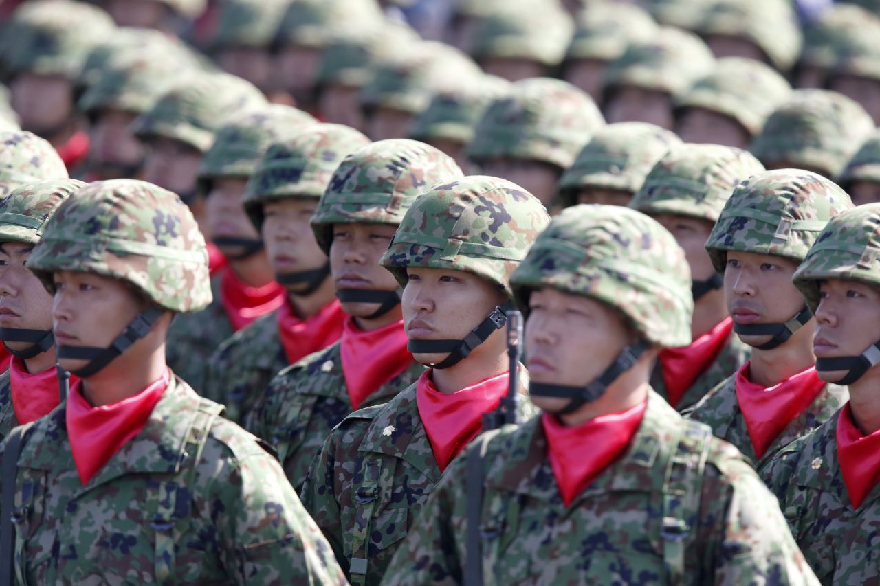 Members of the the Japan Ground Self-Defense Force attend the annual review at the Japan Ground Self-Defense Force Camp Asaka on October 23, 2016. Japan has 151,000 soldiers in its Ground Self-Defense Force.