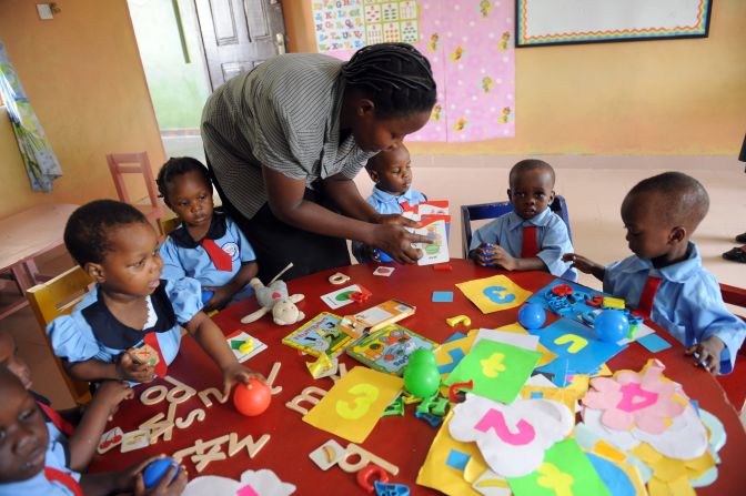 The survey further found 85% of respondents are optimistic about the education that the next generation of Nigerian children will receive.<br /><br />Pictured here, a nursery school teacher uses learning aids at a school in Ibafo district in Ogun State, southwest Nigeria in November 2012. 