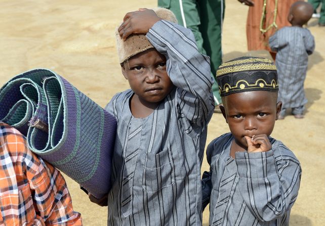 Seven-in-ten Nigerians say gender equality and poverty will be better for the next generation.<br /><br />Pictured here, Muslim boys arrive with a prayer mat in Nigeria's central city of Jos to mark Eid al-Fitr in July 2015.