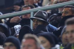 Aubameyang watches his team from the stands during the Champions League against Sporting.