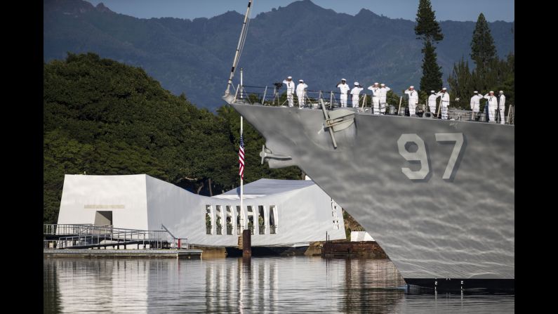 Members of the Navy on the USS Halsey in Honolulu take part in a commemoration ceremony marking the 75th anniversary of the attack on Pearl Harbor on Wednesday, December 7.