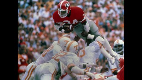 Running back Herschel Walker of the Georgia Bulldogs dives for a touchdown against Tennessee in 1982. 