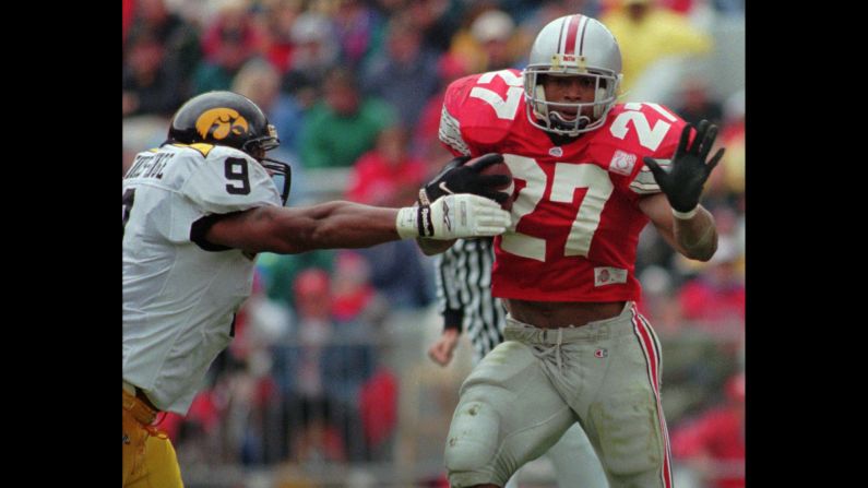 Ohio State's Eddie George pulls away from Iowa defender Bill Ennis-Inge in Columbus, Ohio, on October 28, 1995. After retiring from the NFL, George took up acting and appeared on Broadway as lawyer Billy Flynn in the musical "Chicago" <a href="index.php?page=&url=http%3A%2F%2Fwww.nytimes.com%2F2016%2F01%2F19%2Ftheater%2Feddie-george-leaps-to-chicago-from-the-nfl.html%3F_r%3D0" target="_blank" target="_blank">this year</a>.