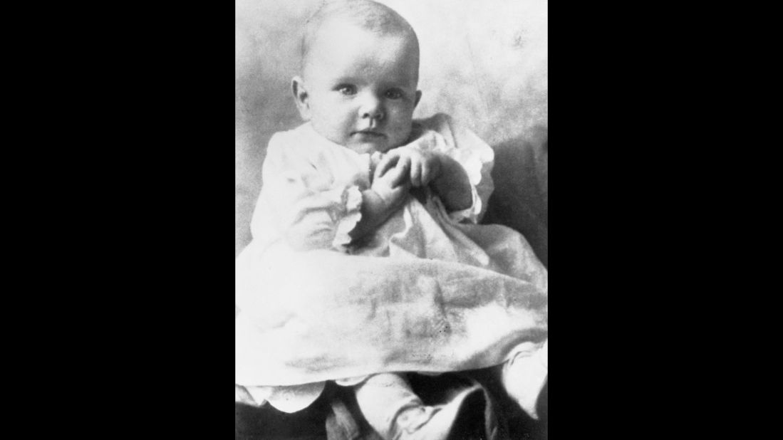 Glenn, here in a family photo at 4 months old, was born July 18, 1921, in Cambridge, Ohio. 
