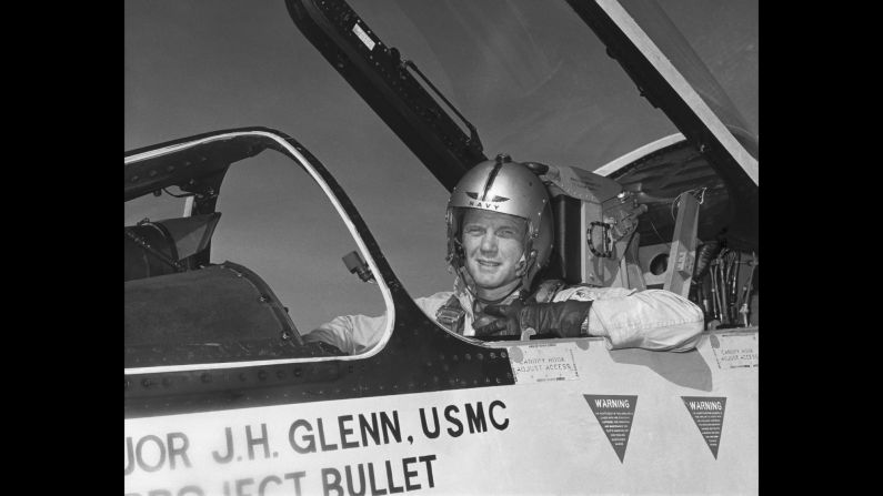 During World War II, Glenn enlisted in the Naval Aviation Cadet Program in 1942 and became a pilot for the US Marines a year later. Glenn, pictured here in the cockpit of an F-8 fighter, completed nearly 150 combat missions in World War II and the Korean War.