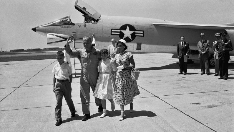 Glenn's family -- wife Annie, daughter, Carolyn "Lyn" and son David -- greet him at Floyd Bennett Field in New York after his record-breaking transcontinental flight.