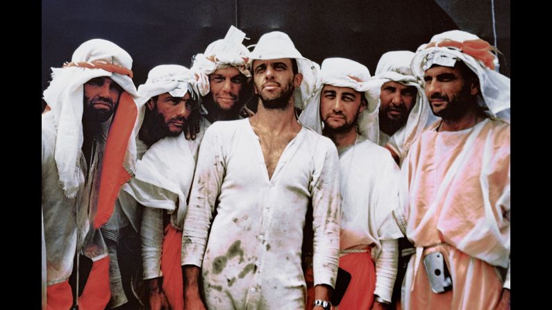 Glenn, third from left, and the six other Mercury 7 astronauts participate in US Air Force survival training exercises in 1960 in Nevada. The training was intended to prepare the astronauts in case of an emergency or faulty landing in a remote area.