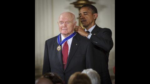 President Barack Obama presents Glenn with the Presidential Medal of Freedom during a May 2012 ceremony at the White House.