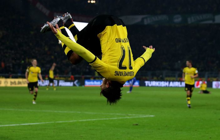 Aubameyang's athleticism has made him one of the world's most feared players on the pitch ... but it's also comes in handy celebrating goals. When he's not pulling on masks, he's performing acrobatic somersaults. 
