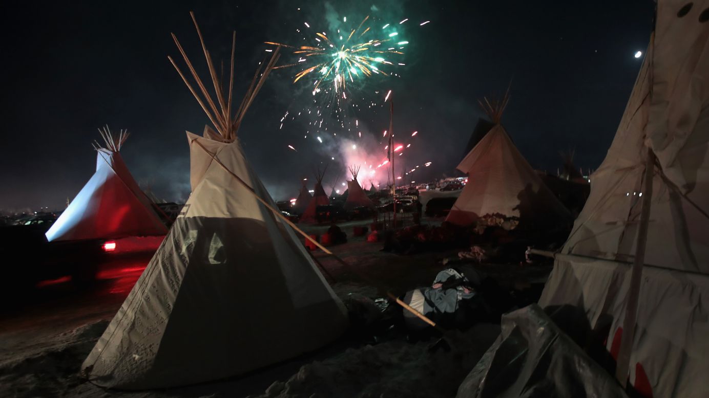 Fireworks light the sky on Sunday, December 4, at the Oceti Sakowin camp near Cannon Ball, North Dakota after news that the Dakota Access Pipeline may be rerouted. The Army Corps of Engineers has <a href="http://www.cnn.com/2016/12/04/politics/dakota-access-pipeline/index.html" target="_blank">denied the current route for the Dakota Access Pipeline</a>, a $3.7 billion project that would cross four states and change the landscape of the US crude oil supply.