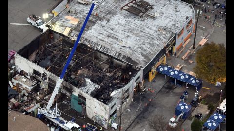 <strong>December 5: </strong>The remains of the Ghost Ship warehouse are seen in Oakland, California. A fire that <a href="http://www.cnn.com/2016/12/05/us/oakland-fire-victims/index.html" target="_blank">killed 36 people</a> ravaged the warehouse during a dance party on December 2. The cause of the fire is still under investigation, authorities said. <a href="http://www.cnn.com/2015/12/03/world/gallery/year-in-pictures-2015/index.html" target="_blank">See 2015: The year in pictures</a>