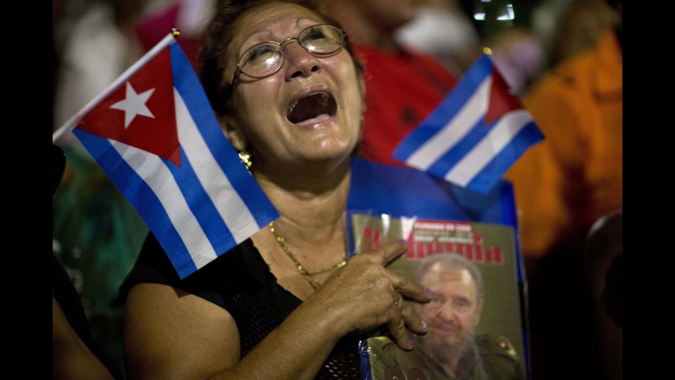 A woman holding a portrait of longtime Cuban leader Fidel Castro cries moments after his funeral procession passed by in Bayamo, Cuba, on Friday, December 2. Castro <a href="http://www.cnn.com/2015/07/05/world/gallery/fidel-castro/index.html" target="_blank">died at age 90</a> on November 25. <a href="http://www.cnn.com/2016/11/28/americas/gallery/cuba-remembers-castro/index.html" target="_blank">Cuba remembers Castro</a>