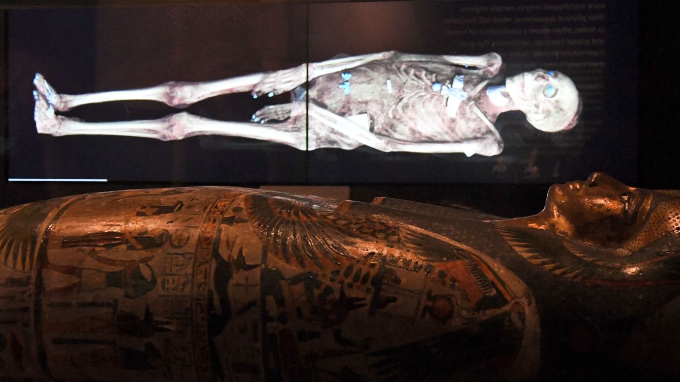 A three-dimensional image of an Egyptian mummy is projected above a sarcophagus in a joint British-Australian exhibition in Sydney on Thursday, December 8. The three-dimensional images of six ancient Egyptian mummies, aged between 900 BC and 140-180 AD, have been held at the British Museum but never physically unwrapped. The images give insight into what it was like to live along the Nile River thousands of years ago.