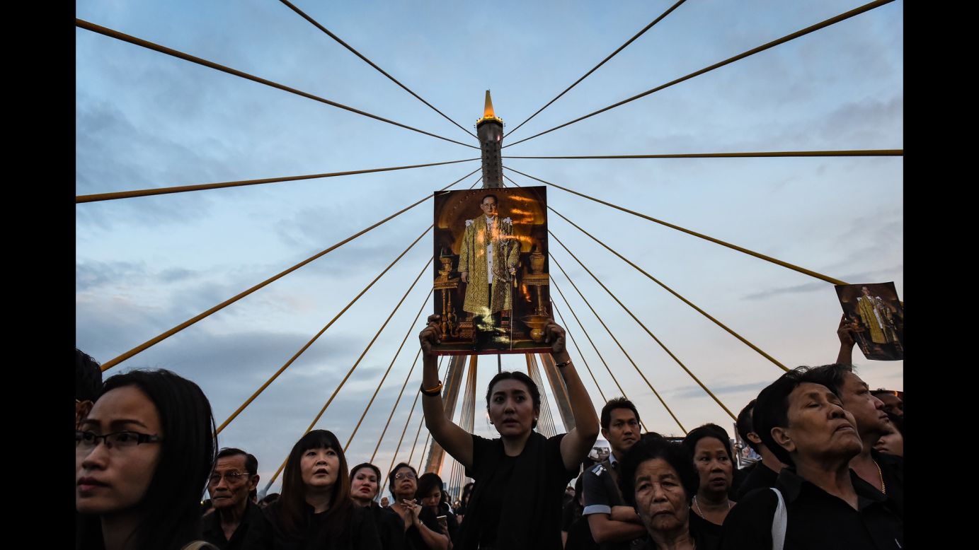 A woman holds a picture of the late Thai King Bhumibol Adulyadej as people gather to commemorate his birthday on Bhumibol Bridge in Bangkok, Thailand, on Monday, December 5. Bhumibol, a revered figure who helped unify the nation in his 70-year reign, <a href="http://www.cnn.com/2016/10/13/asia/thai-king-bhumibol-adulyadej-dies/" target="_blank">died on October 13</a> at age 88. <a href="http://www.cnn.com/2016/10/12/asia/gallery/thai-king-bhumibol-adulyadej/index.html" target="_blank">Thailand's King Bhumibol Adulyadej: A life in pictures</a>