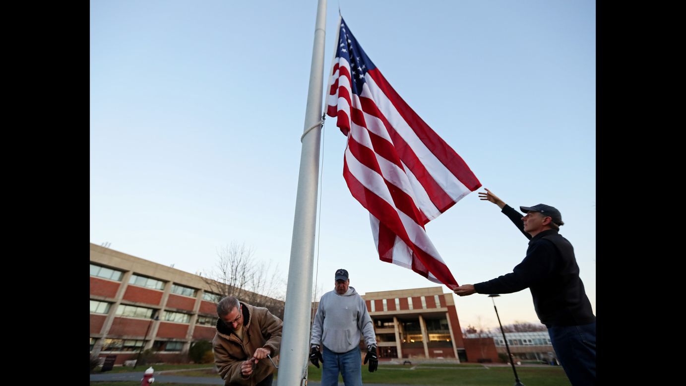 The US flag is raised at Hampshire College in Amherst, Massachusetts, on Friday, December 2. The flag was removed from the campus three weeks ago after the presidential election. After calls, e-mails and protests from people angered by its removal, <a href="http://www.cnn.com/2016/12/02/us/hampshire-college-american-flag-trnd/" target="_blank">Hampshire College President Jonathan Lash said</a> the school now raises the flag as a symbol of freedom "and in hopes for justice and fairness for all."