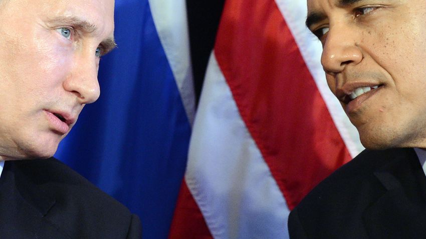 US President Barack Obama (R) listens to Russian President Vladimir Putin after their bilateral meeting in Los Cabos, Mexico on June 18, 2012 on the sidelines of the G20 summit. Obama and President Vladimir Putin met Monday, for the first time since the Russian leader's return to the presidency, for talks overshadowed by a row over Syria. The closely watched meeting opened half-an-hour late on the sidelines of the G20 summit of developed and developing nations, as the US leader sought to preserve his "reset" of ties with Moscow despite building disagreements. AFP PHOTO/Jewel Samad        (Photo credit should read JEWEL SAMAD/AFP/Getty Images)