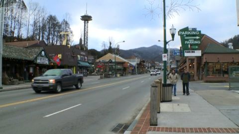 Cars and pedestrians returned to Gatlinburg on Friday as the city works to recover from wildfires.