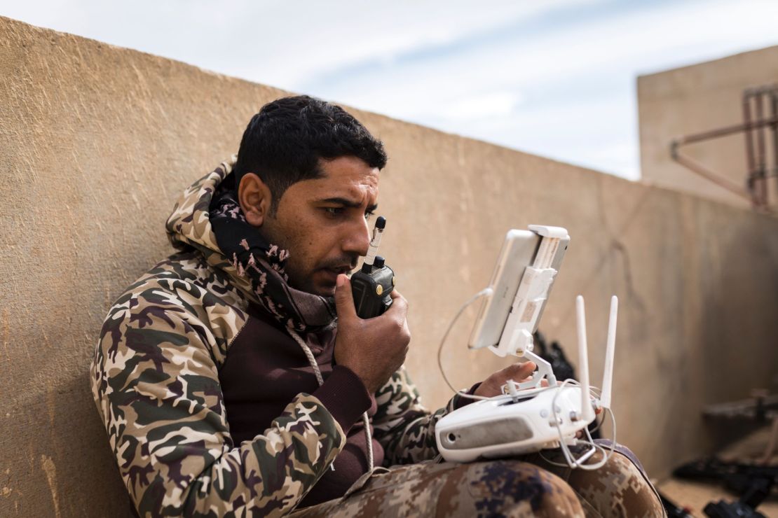  A soldier from the Mosul Brigade of the Iraqi forces operates a drone on December 5.
