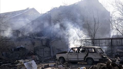 Smoke billows around houses near where a train derailed and exploded Saturday in northeast Bulgaria. 