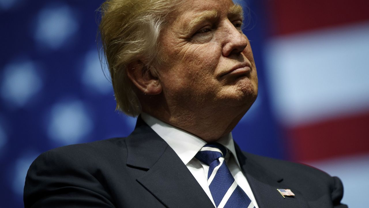 President-elect Donald Trump looks on during at the DeltaPlex Arena, December 9, 2016 in Grand Rapids, Michigan.