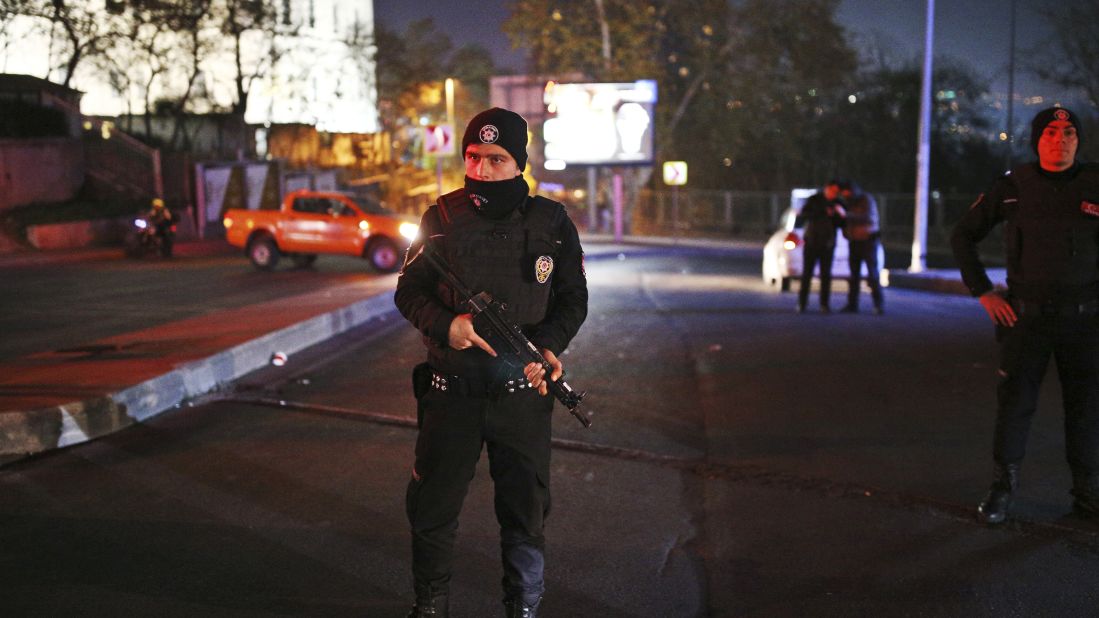 Turkish police officers cordon off roads leading to the area of the Besiktas football club stadium in Istanbul late Saturday.