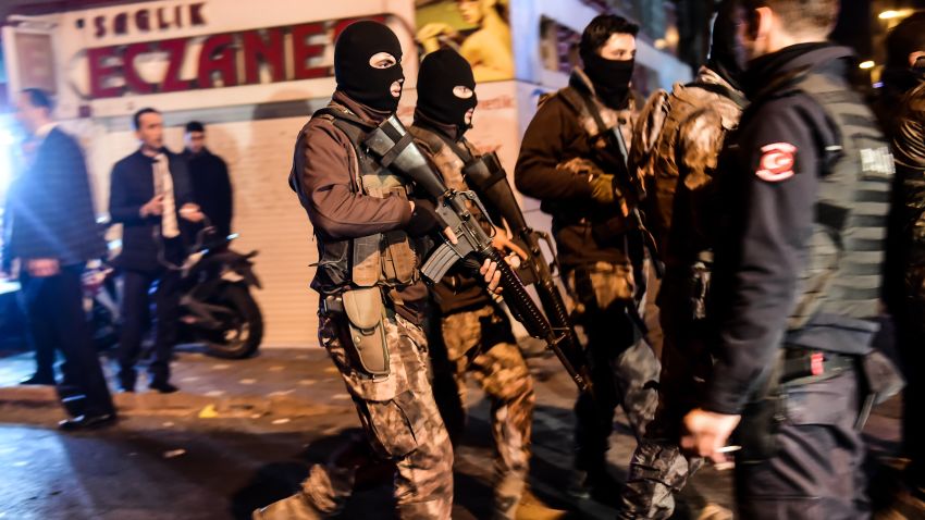 Turkish special force police officers patrol streets after a car bomb exploded near the stadium of football club Besiktas in Istanbul on December 10, 2016. 
The car bomb exploded in the heart of Istanbul on late December 10, wounding around 20 police officers, Turkey's interior minister said, quoted by the official Anadolu news agency. The bomb, apparently targeting a bus carrying police officers, exploded outside the stadium of Istanbul football club Besiktas following its match against Bursaspor. / AFP / YASIN AKGUL        (Photo credit should read YASIN AKGUL/AFP/Getty Images)