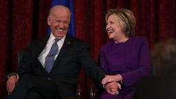 Hillary Clinton shares a moment with Vice President Joe Biden on December 8, 2016, on Capitol Hill.