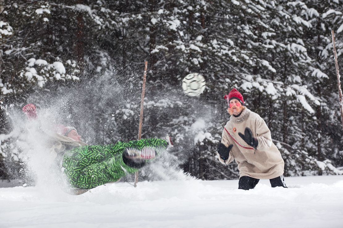 Scissorkicks in the snow are par for the course for FC Santa Claus.