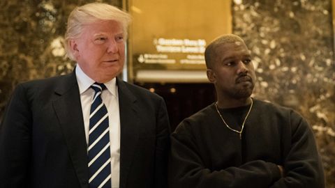 NEW YORK, NY - DECEMBER 13: (L to R) President-elect Donald Trump and Kanye West stand together in the lobby at Trump Tower, December 13, 2016 in New York City. President-elect Donald Trump and his transition team are in the process of filling cabinet and other high level positions for the new administration.
